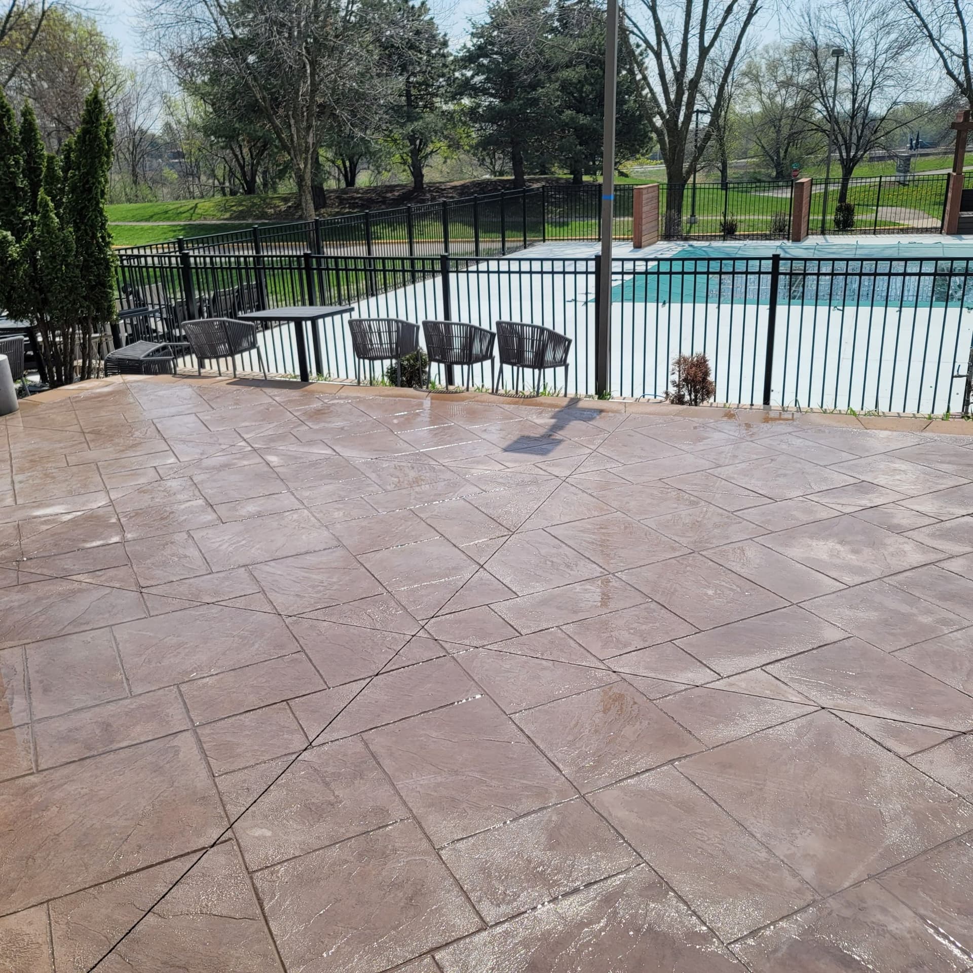 Stamped Concrete Patio Adds Style to Apartment Building