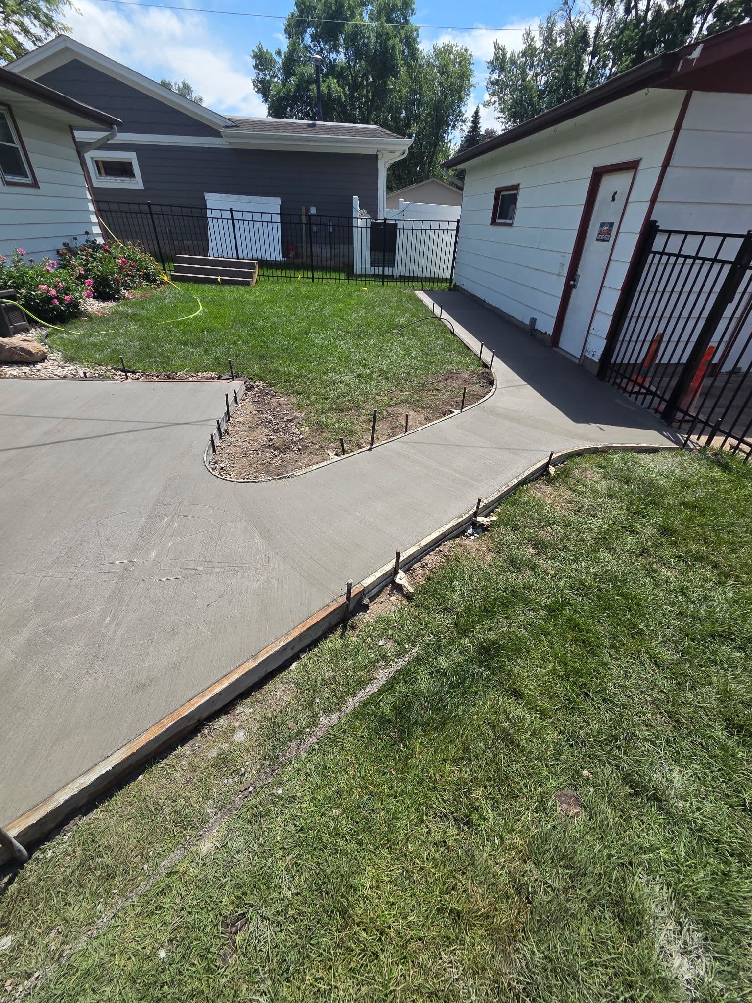Gallery photos for New Concrete Patio and Sidewalks That Actually Work For Your Home: Image #1