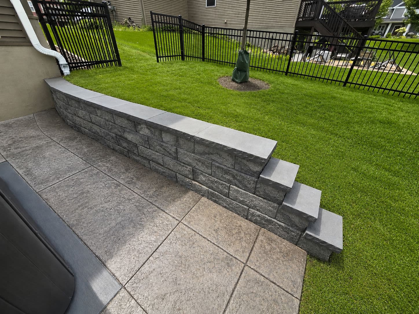 Versa-Lok Retaining Wall Built for a Repeat Customer in Lakeville image